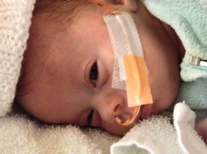 Lillian Grace playing peek-a-boo when she is supposed to be snoozing.