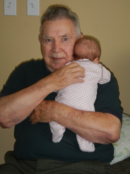 Grandpa George burping Ellie