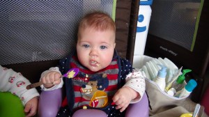 Bella loves to help feed herself