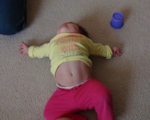 Kali's characteristic head stand